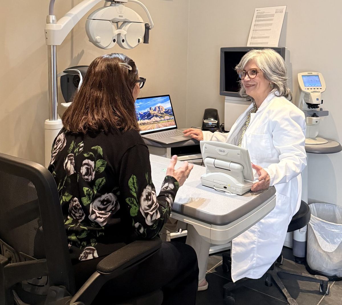 Dr. Roxanna Gangi performing an eye exam in her Toronto clinic