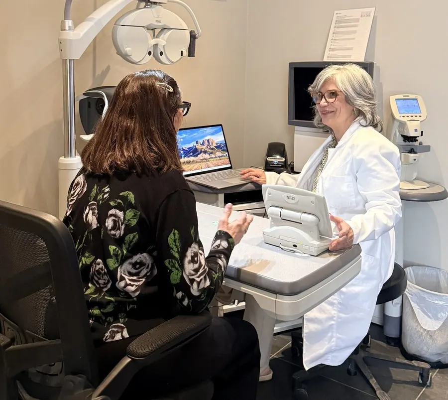 Dr. Roxanna Gangi performing an eye exam in her Toronto clinic
